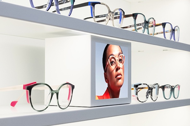 Top Vision Group glasses shelf branding Top Vision Instore glasses shelf branding