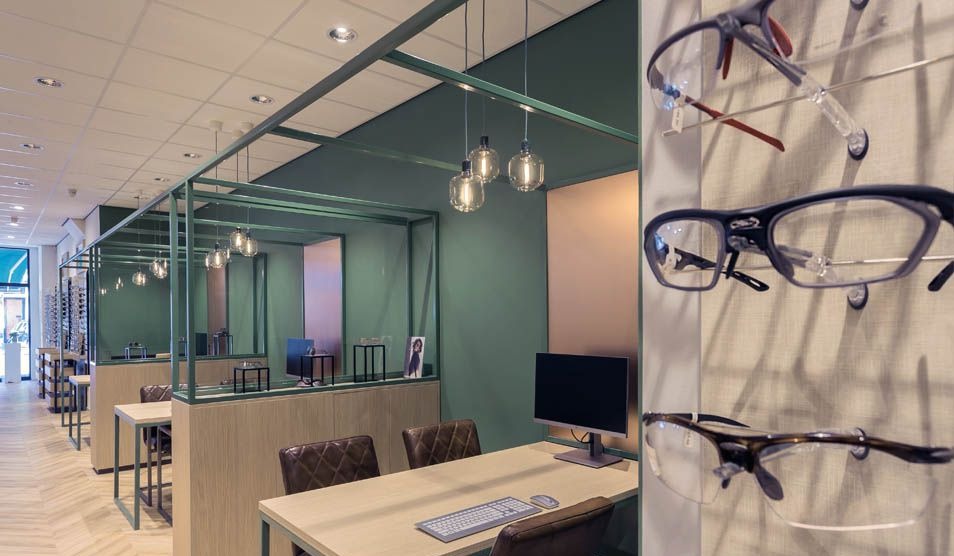 Top Vision Instore optiek winkel design zonnebrillen houder